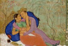 Kama Sutra couple on bed