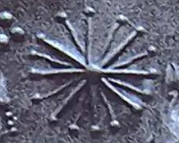 Étoile à seize points. Détail, sceau cylindrique sumérien.