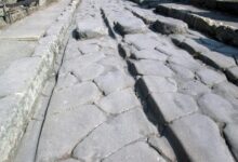 The passage of carts over decades could cause ruts (like the one shown), particularly in high-traffic areas of Pompeii.