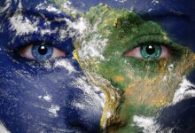 Earth painted on face. Elements of this image furnished by NASA. Gaia reminds us of our connection with the living Earth.