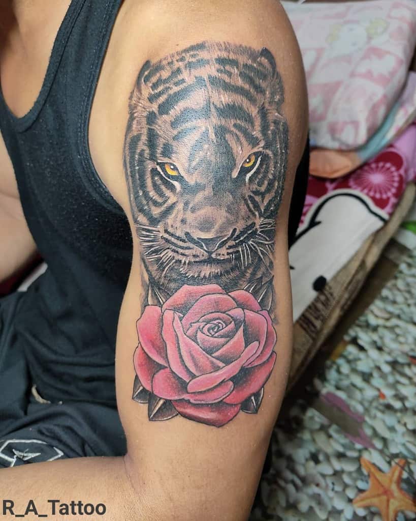 tatouages de rose tigrée sur le bras r_a_tattoo
