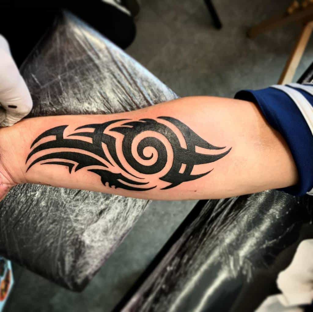Small Tribal Arm Tattoos goodman.tattoo