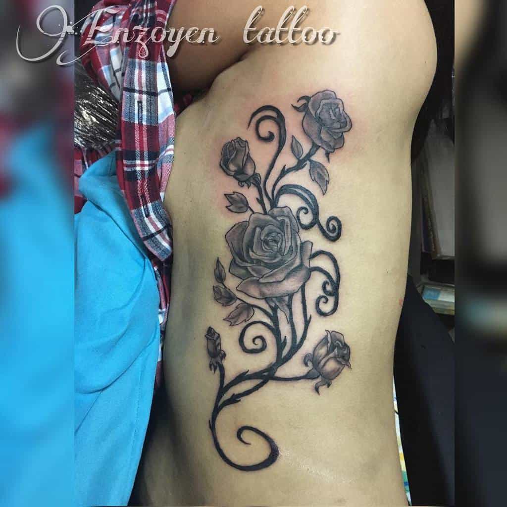 Tatouages de roses tribales M. Gutierrez_tattoo