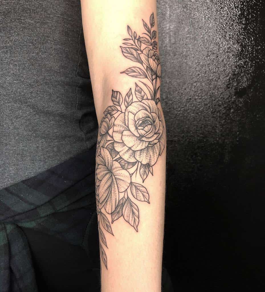 tatouages d'avant-bras de vigne rose rolando_castillejos
