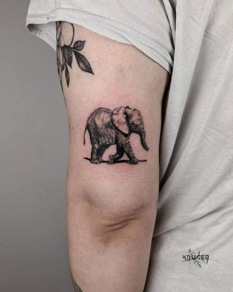 Tatouage d'un petit éléphant noir Tatouage Kruger