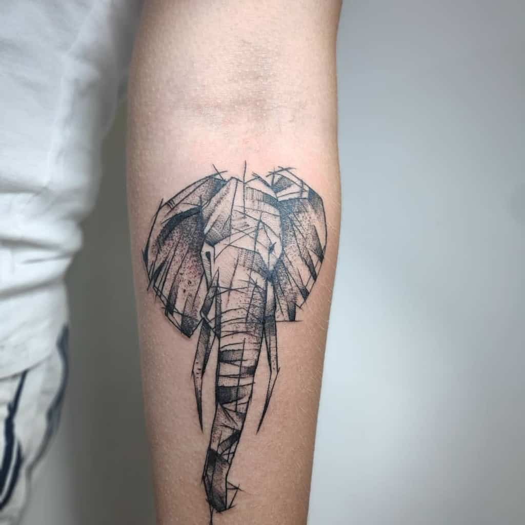 Tatouage de l'avant-bras d'un petit éléphant 2 Dewattooandbodypiercing