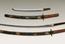 Antique Japanese daishō, the traditional pairing of two Japanese weapons which were the symbol of the samurai, showing the traditional Japanese sword cases (koshirae) and the difference in size between the katana (bottom) and the smaller wakizashi (top).