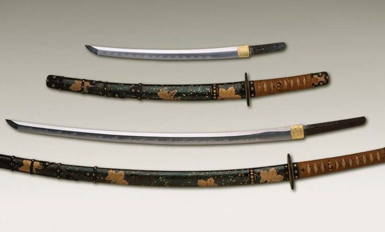 Antique Japanese daishō, the traditional pairing of two Japanese weapons which were the symbol of the samurai, showing the traditional Japanese sword cases (koshirae) and the difference in size between the katana (bottom) and the smaller wakizashi (top).