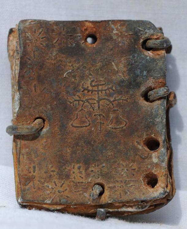 Symboles dans l'un des codices de plomb.