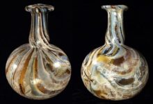 Roman marbled glass piriform unguentarium.