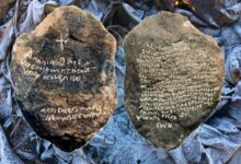 Front and back of the original Dare Stone