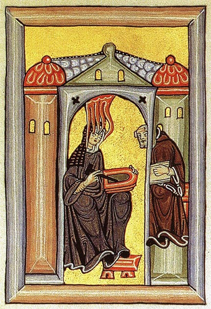 Les Scivias, montrant Hildegarde de Bingen recevant une vision, dictant à Volmar, et dessinant sur une tablette de cire. (Eisenacher~commonswiki / Domaine public)